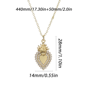 Detailed view of gold heart pendant with dimensions 28mm by 14mm on a thin chain