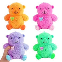Set of four colorful LED glowing bear squishy toys for kids stress relief and fun play