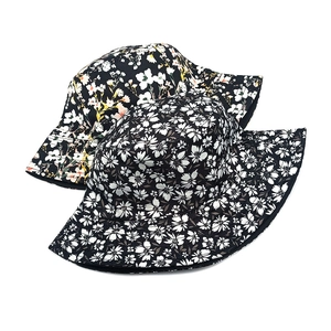 Reversible floral bucket hat for women with black small flower and colorful prints