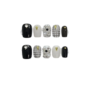 Handmade press-on nails with luxury black and white plaid design, pearls and silver chains