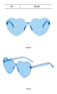 Detailed front and side view of blue heart shaped rimless sunglasses with blue lenses