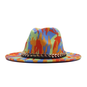 Detail of colorful abstract graffiti felt hat with a decorative gold chain link band