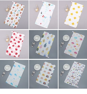 Detail showcasing nine printed patterns of 6-layer cotton gauze square towels for kids