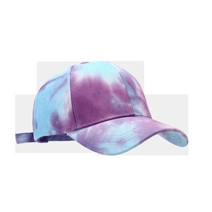 Detail view of tie-dye baseball cap featuring blue and purple canvas with adjustable strap
