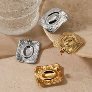 Square hammered stainless steel earrings in gold and silver with a vintage 3D relief texture