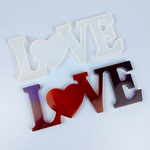Silicone LOVE letter resin mold with heart shape and finished colorful art piece