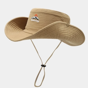 Close-up of khaki outdoor sun hat featuring mountain embroidery and adjustable wind cord