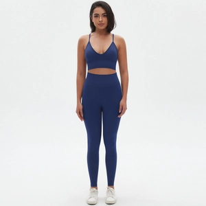 Deep blue seamless yoga set featuring a V-neck sports bra and high-waist leggings