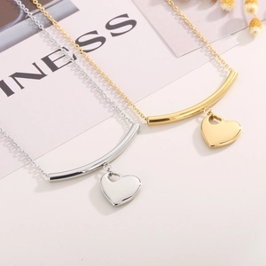 Fashionable stainless steel smile heart pendant necklace set in gold and silver finish