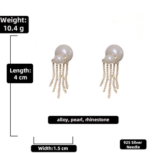 Detail of pearl earrings with rhinestone tassels and 925 silver needles for women