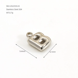 Macro detail of silver bubble letter B pendant in stainless steel with exact measurements