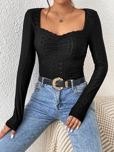 Women's slim fit black long sleeve lace top with a square neckline and ruched front detail