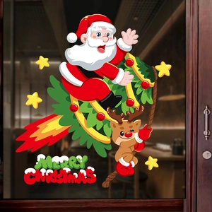 Christmas window decals with Santa Claus and reindeer on glass storefront