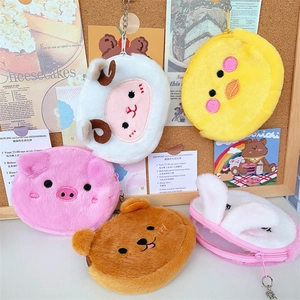 Macro shot of assorted animal plush coin purses with zipper and metal keychains