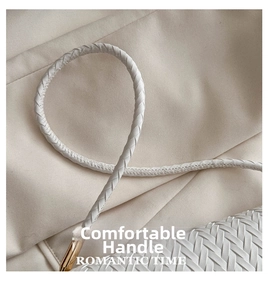Detailed close-up of white woven leather texture and comfortable braided handle