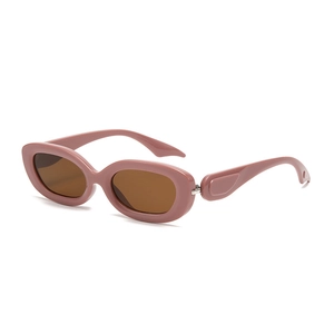 Modern oval sunglasses with vintage pink frames and brown lenses for outdoor protection