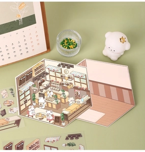 DIY miniature cafe scene showing blank base card and layered PET stickers for kids