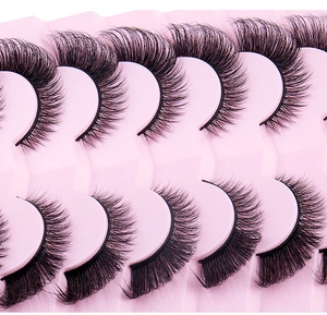 Detail of 7 pairs of foxy eye false eyelashes with thick curl on a pink tray