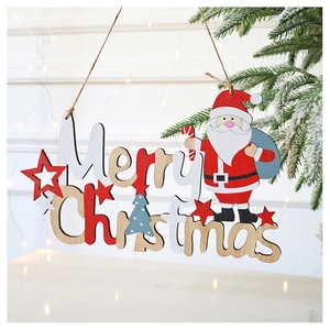 Close-up of Merry Christmas wooden pendant with Santa Claus and stars on festive background