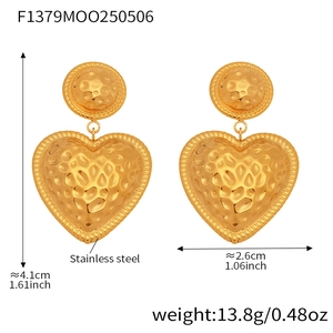 Detail view of heart-shaped steel earrings with dimensions 4.1cm by 2.6cm and weight specs