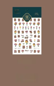 Detail of ultra-thin KX101 bear and tulip nail art stickers for professional manicure