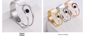 Detailed view of vacuum plated stainless steel bangles in silver, gold and rose gold finishes