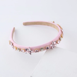 Detail view of pink crystal flower headband with rhinestones and anti-slip velvet lining