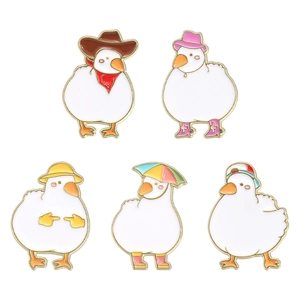 Set of five cute white duck enamel pins in various cartoon styles on a white background