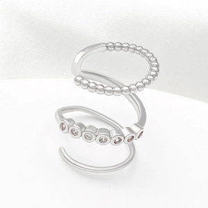 Sparkling silver multi-layer spiral ear cuff with zircons in a modern minimalist design