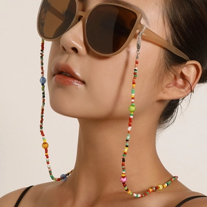 Rainbow beaded eyewear strap with colorful acrylic beads on a model, stylish and vibrant