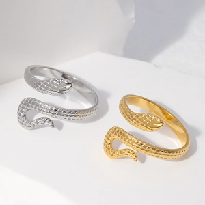 Snake shaped stainless steel open rings in gold and silver colors with scale texture