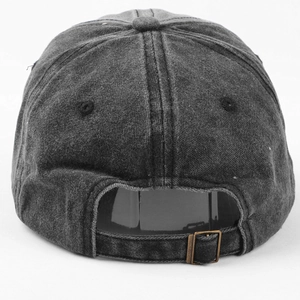 Detail view of the washed cotton baseball cap with adjustable metal buckle and back strap