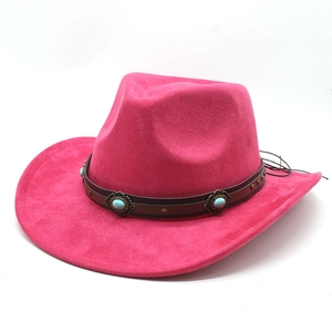 Detail of rose pink suede cowboy hat with vintage turquoise and metal buckle band