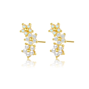 Elegant S925 floral earrings with blue crystal, pearl and gold plating on white surface