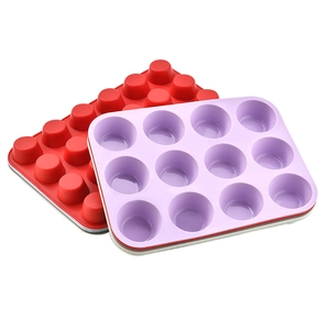 Set of 2 flexible 12-cup silicone muffin pans in red and purple for non-stick baking