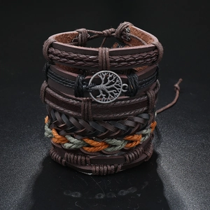 Detail of multi-layer braided leather bracelets with Tree of Life metal pendant and ropes