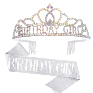 Close-up of sparkling silver rhinestone crown and birthday girl sash for party decor