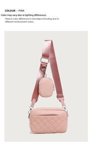 Pink quilted crossbody camera bag with adjustable strap and detachable round pouch charm