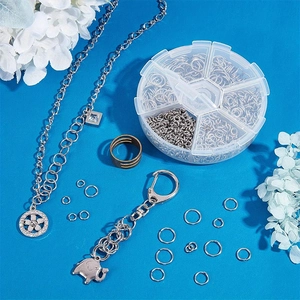 Macro shot of stainless steel open jump rings in organizer for DIY jewelry making