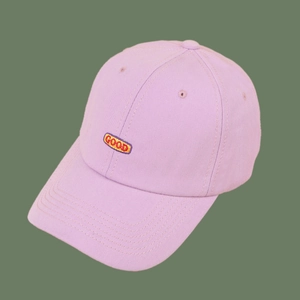 Detail view of purple cotton baseball cap with GOOD embroidery and quality stitching