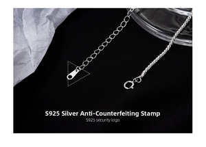 Macro detail of S925 sterling silver spring clasp and authentic hallmark engraving