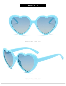 Dual view of sky blue heart-shaped sunglasses with blue gradient lenses and resin frame