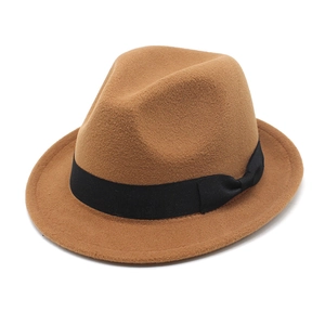 Classic camel wool jazz fedora hat with black ribbon bow on white background