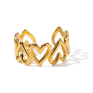 Adjustable golden hollow heart band ring with a vintage minimalist open design style