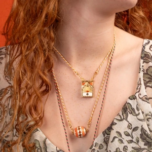 Bohemian multilayer gold necklace with colorful enamel tarot pendant and zircon sunburst details