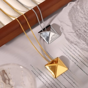 Gold and silver 3D pyramid pendant necklaces on a box chain with a chic metallic finish