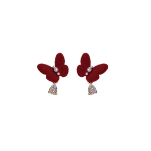 Elegant red butterfly stud earrings with pearls and pear-shaped zircon on white background