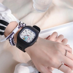 Detail of square quartz watch featuring a cute cartoon elephant dial and silicone strap