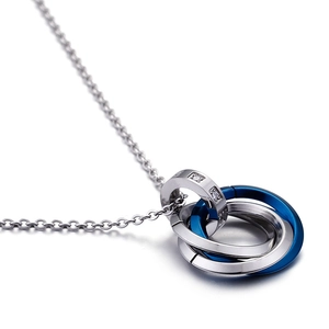 Interlocked silver and blue stainless steel ring pendant necklace with crystal accents