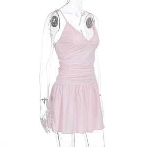 Detailed view of the V-neckline and horizontal ruching on a pink summer mini dress